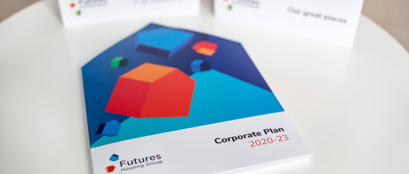 Copies of our corporate plan on a table