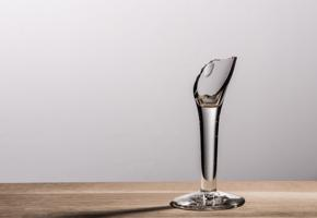 Broken stem of a wine glass on a table