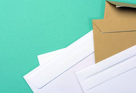 Several empty white and brown envelopes